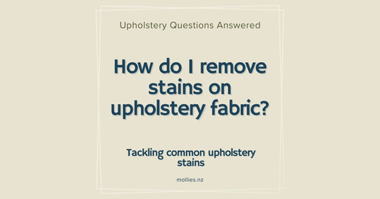 How do I remove stains on upholstery fabric?