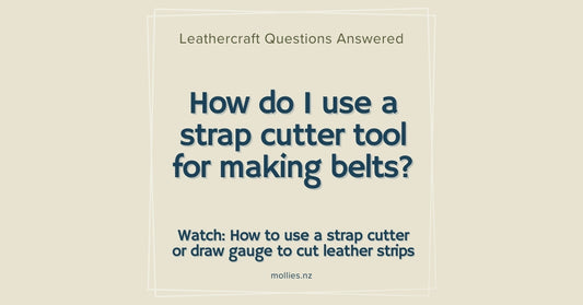 How do I use a strap cutter tool for making belts?