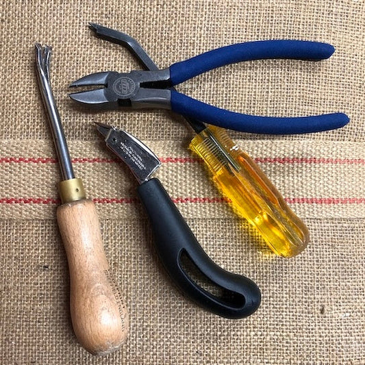 Upholstery tools including pliers, tack lifter, staple puller and staple remover
