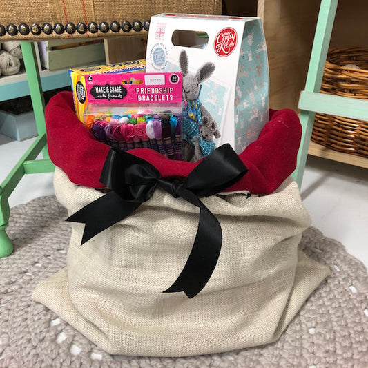 Santa sack full of gifts with a big bow