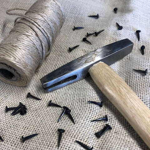 Upholstery tack hammer, tacks and twine