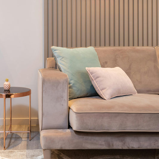 Couch with scatter cushions both with piping