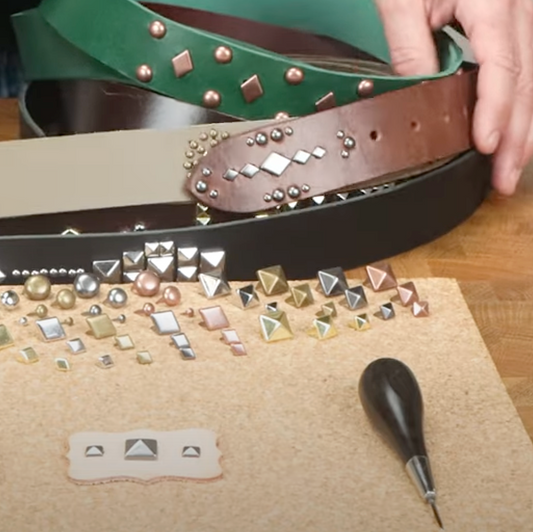 Leather belts with decorative spots and studs