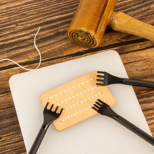 Stitching chisels, leather piece and rawhide mallet