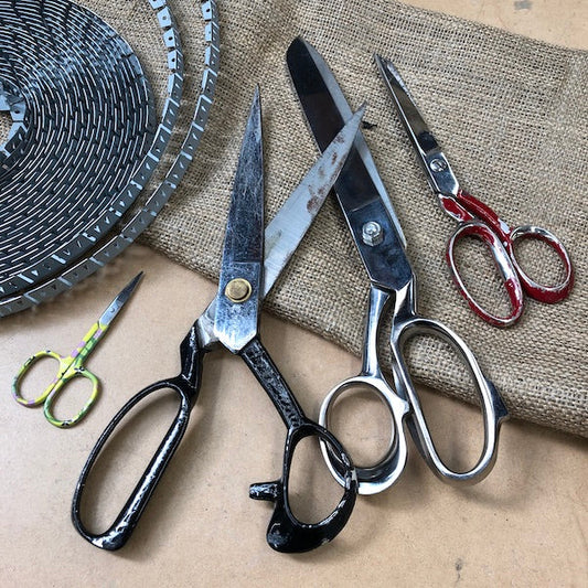 Upholstery Scissors and flexible metal tack strip