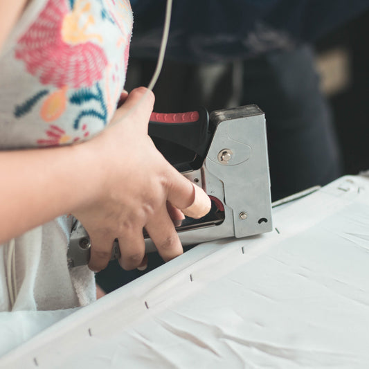 Using a hand held staple gun for upholstery